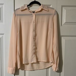peach colored blouse